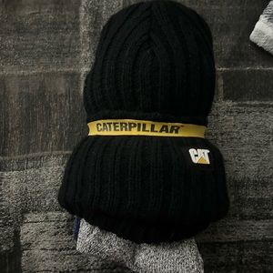 Caterpillar beanie and socks bundle. Brand new. Sock size is 10-13.